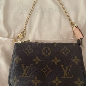 Louis Vuitton Mini Pochette with Chain.